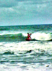 Tammie Knight cathches a wave in the mid 1980's